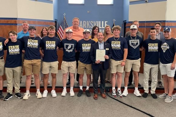 The Providence High School Baseball Team poses with the Clarksville Town Council.