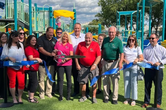 Officials cut the ribbon opening the Ashland Park Playground